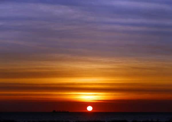 The sun rises over the North Sea