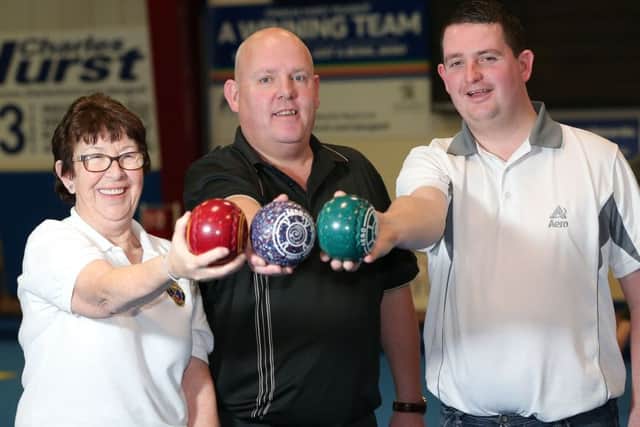 Six times World Indoor Bowls champion Alex Marshall (centre), with Irish International Graham McKee (Jim Baker Stadium)and Bridie ORourke (Belfast Indoor Bowls Club).