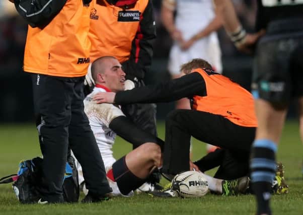 Ulster scrumhalf Ruan Pienaar receives attention during the first half of last weeks game against Glasgow Warriors