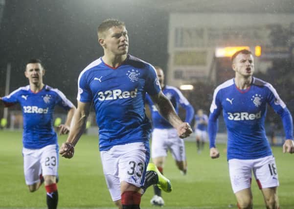 Martyn Waghorn celebrates his early penalty for Rangers
