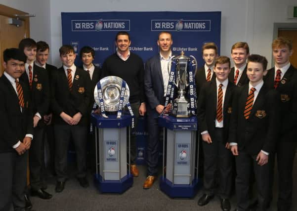 Killicomaine Junior High School pupils with Ulster Bank rugby ambassadors Stephen Ferris and Alan Quinlan during the Ulster Bank hosted RBS 6 Nations Trophy Tour, in Portadown.
