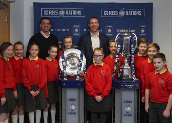 Howard Primary School pupils along with Ulster Bank rugby ambassadors Stephen Ferris and Alan Quinlan during the Ulster Bank hosted RBS 6 Nations Trophy Tour, in Portadown.