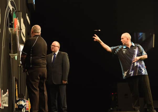 Phil Taylor in action in Dublin. Pic by Philip Fitzpatrick