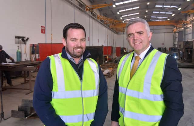 Enterprise Minister Jonathan Bell pictured with Brian Lagan, managing director  of expnading Cookstown firm Lagan Engineering