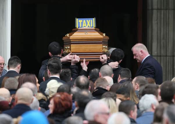 The coffin is carried into Our of Lourdes Church in Dublin for the funeral of Eddie Hutch senior who was shot dead in the north inner city last week