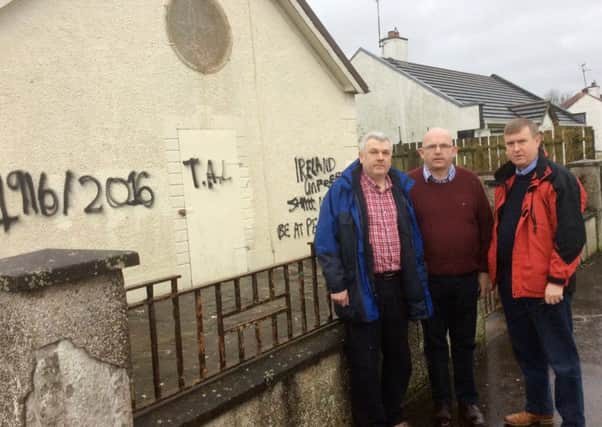 Press Eye - Belfast - Northern Ireland - 20th February 2016

General view of Rasharkin Orange Hall in County Antrim which was attacked with  graffiti in an overnight attack.
DUP Councillors Alan McClean and John Finlay are pictured with Finance Minister Mervyn Storey at the hall.

Picture by Press Eye.