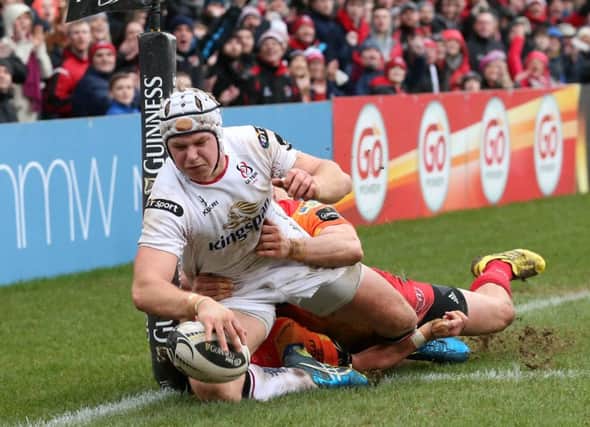 A determined 

Luke Marshall goes over for a try for Ulster against Scarlets
