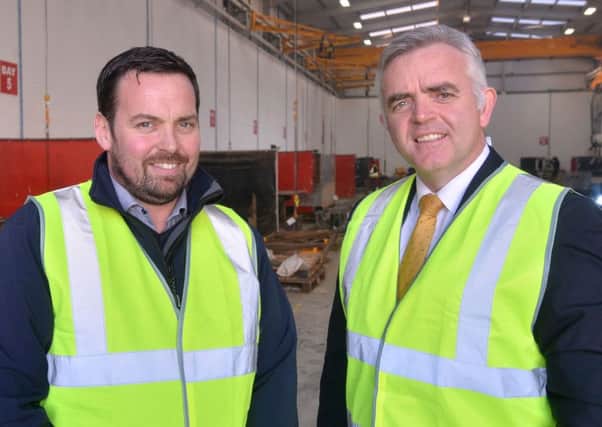 DETI Minister Jonathan Bell (right) with Brian Lagan, managing director of Lagan Engineering Ltd in Cookstown