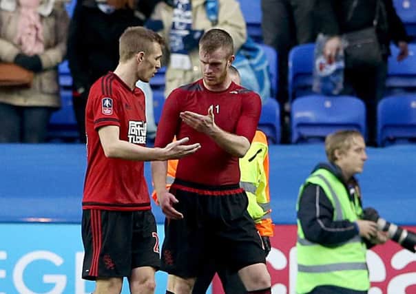 West Brom's Chris Brunt (right) reacts as he speaks with team-mate Darren Fletcher