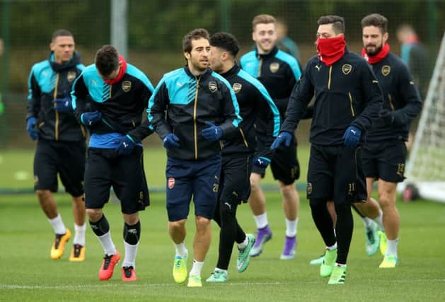 Arsenal's Mathieu Flamini (centre) during a training session at London Colney, London. PRESS ASSOCIATION Photo. Picture date: Monday February 22, 2016. See PA story SOCCER Arsenal. Photo credit should read: Adam Davy/PA Wire.