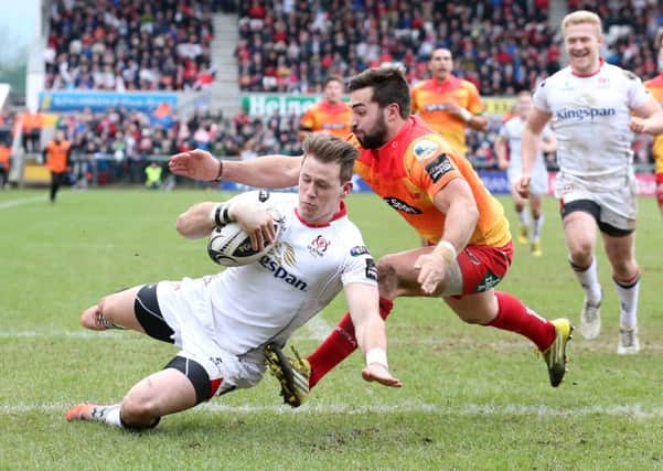 Ulster's Craig Gilroy outpaces Gareth Owen and  goes in for a try against Scarlets during the Guinness PRO12 game at Kingspan Stadium