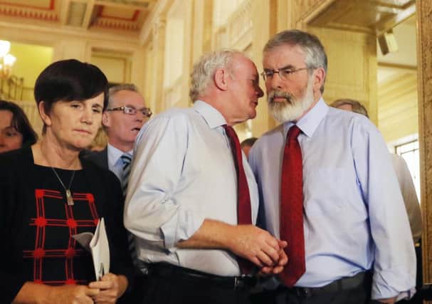 Sinn Fein's Martin McGuinness and party president Gerry Adams