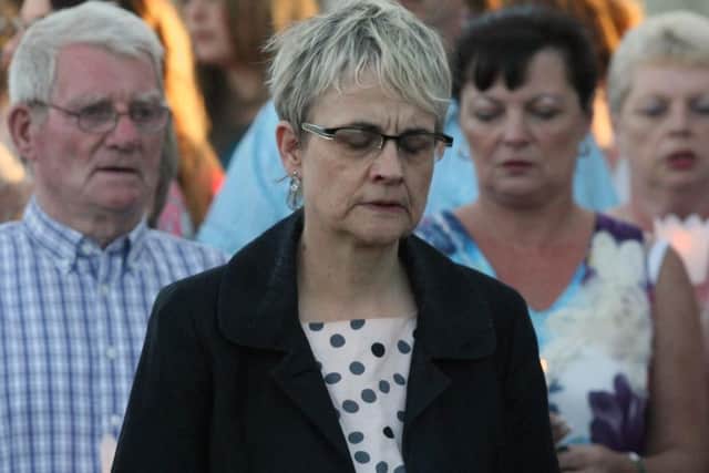 Margaret Ritchie joins mourners in paying respect to the victims of the Loughinisland massacre on the 20 year anniversary.