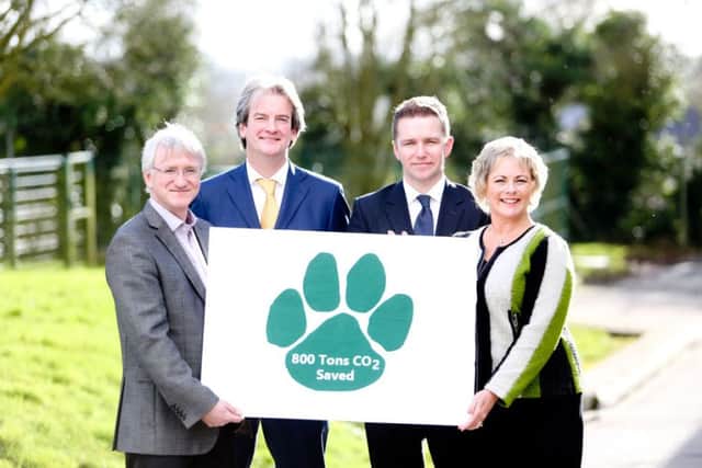 Mackle Petfoods managing director John Mackle, left, with Michael Scott, MD, firmus energy, Eric Cosgrove, firmus director of engineering and Utility Regulator chief executive Jenny Pyper