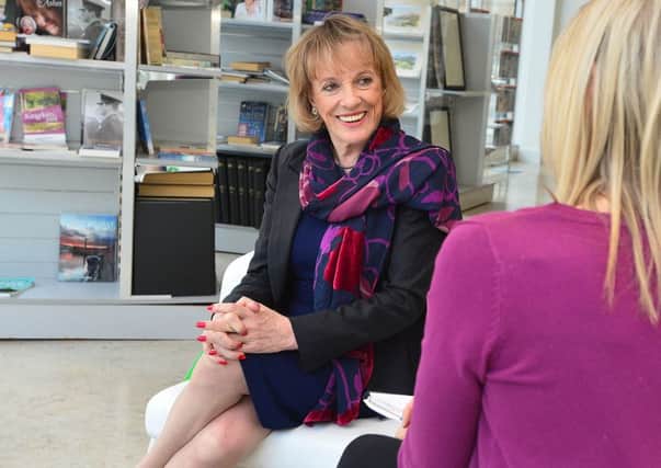 Dame Esther Rantzen in the News Letter offices in Belfast talking to journalist Laura McMullan