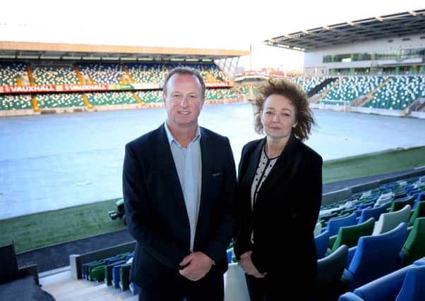 Sports Minister Caral N ChuilÃ­n with Northern Ireland manager Michael O'Neill at the headquarters of the Irish Football Association at Windsor Park.