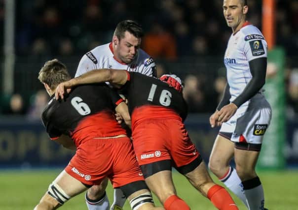 6

Ricky Lutton is tackled by Michael Rhodes and Juan Figallo