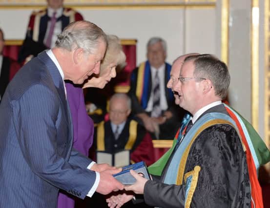 The Prince of Wales with Queens Professor Patrick Johnston