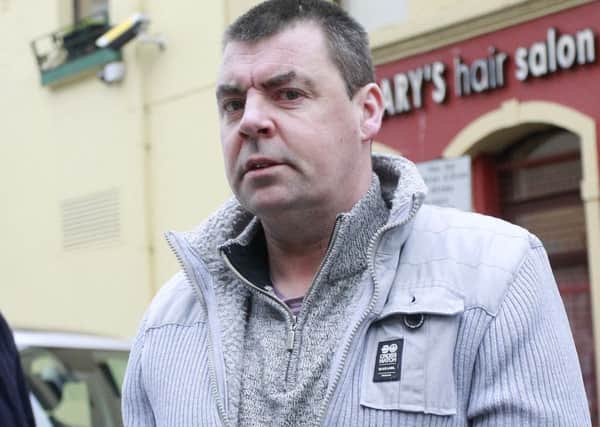 Seamus Daly arrives at Omagh court in county Tyrone, he is accused of murdering 29 people in the Real IRA bomb in Omagh in 1998