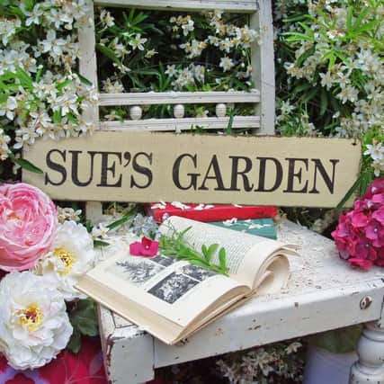 The personalised wooden garden sign, available from ijustloveit.co.uk