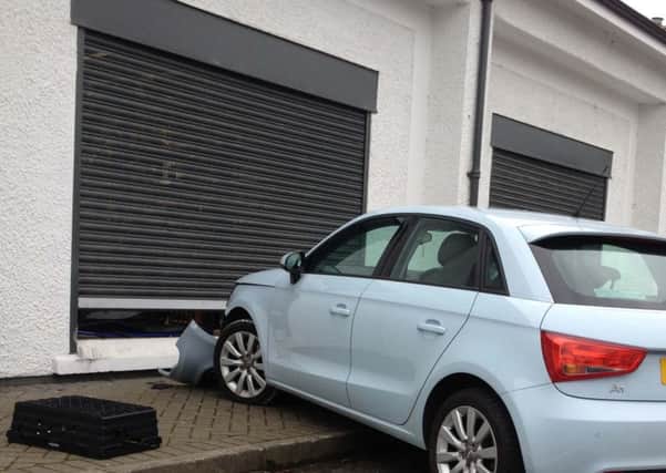 A car crashed through the window of the Ballycastle Co Op earlier today