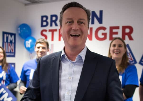 David Cameron addresses activists at the Britain Stronger In Europe campaign headquarters in London on Friday