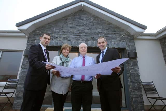William and Heather Hamilton, centre, with Philip McNeill, left and Nigel Walsh of Ulster Bank