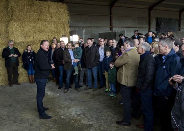 Prime Minster David Cameron addresses local farmers at Ballybollan House in Ahoghill, Co Antrim, during his flying visit on Saturday