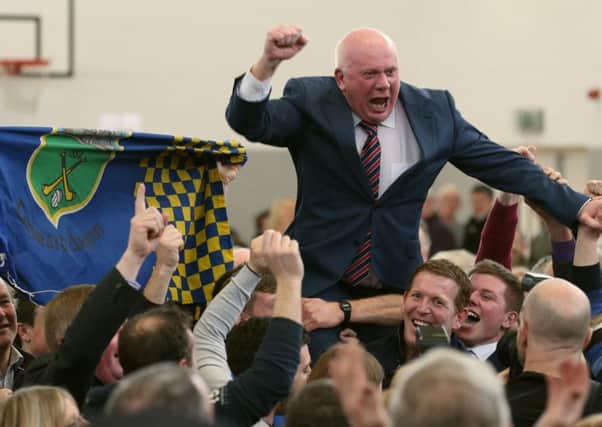 Fianna Fails Jackie Cahill is hoisted into the air as he celebrates being elected TD in Tipperary