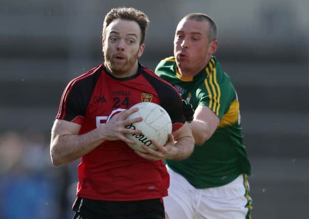 Down's Peter Fitzpatrick in action with Kerry's Kieran Donaghy