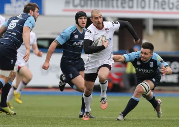 Ruan Pienaar of Ulster rips through the Cardiff Blues defence