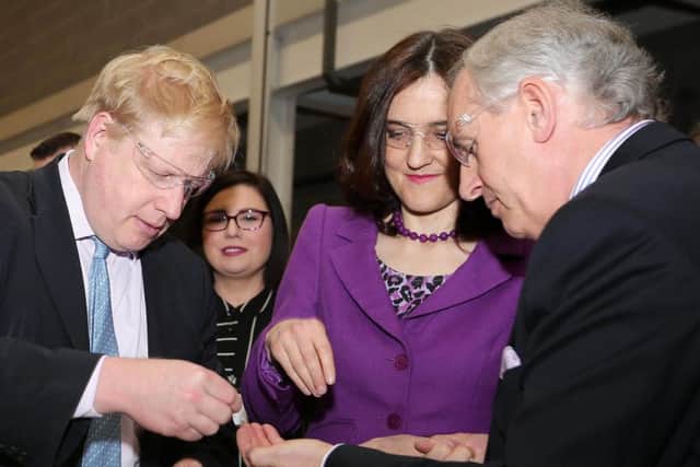 Boris Johnston and Theresa Villiers during their visit to Boomer Industries.The company manufactures plastic window sills for the Routemaster buses in service in London