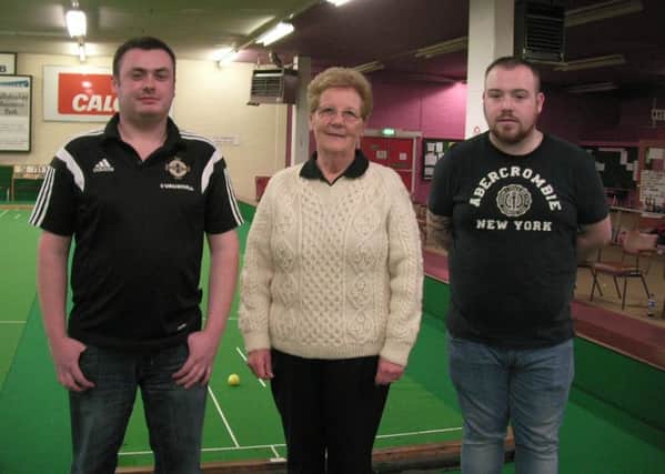 Winner of the Ballybrakes short mat pairs,  Nathan Haire an Terry Crawford, St Anthonys, Portadown, with Club president Alice Elliott