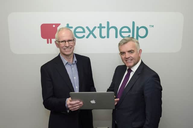 Texthelp chief executive Mark McCusker pictured with Enterprise Minister Jonathan Bell