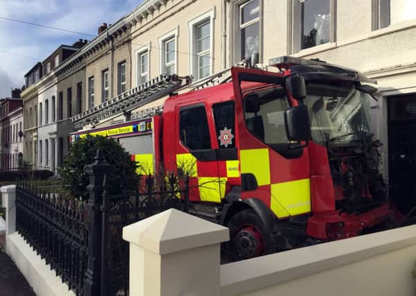 The fire engine that was stolen from a station and driven into cars and houses in Larne, as a teenager and a pensioner have been charged with a string of offences in connection with the incident