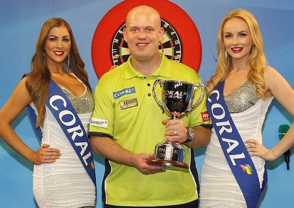Michael van Gerwen retains Coral UK Open title. Pic by Lawrence Lustig/PDC