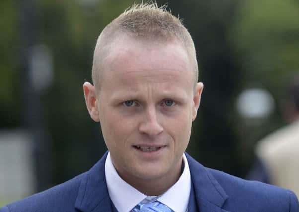 Jamie Bryson was given a six-month suspended sentence for taking part in illegal public processions