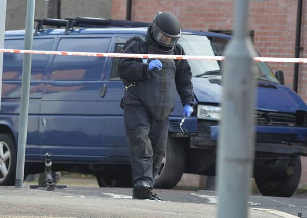 A forensic officer on the scene of the bombing