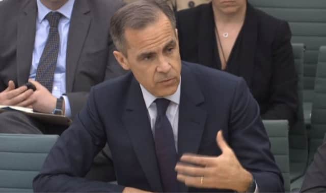 Bank Governor Mark Carney denied being under pressure from any quarter