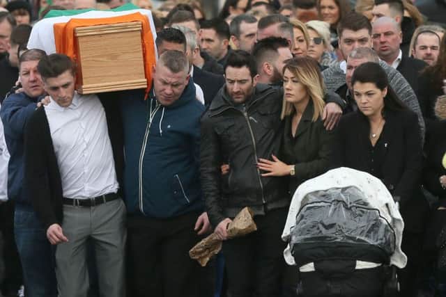 The coffin of dissident republican Vincent Ryan is carried into The Church of the Holy Trinity in Donaghmede, Dublin, for his funeral Mass