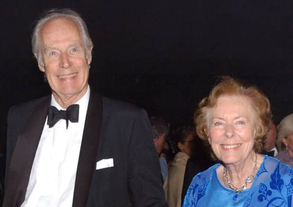 Sir George Martin, pictured with wife Judy in 2002, has died aged 90
