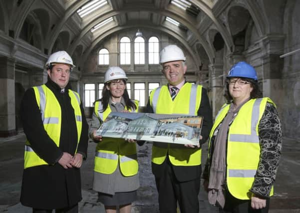 Undated PR handout CGI of  (left to right) James Eyre, Titanic Quarter's Commercial Director, Kerrie Sweeney, Titanic Foundation's CEO, Northern Ireland's Enterprise Minister, Jonathan Bell and Angela Lavin, Heritage & Lottery Fund, in the former Harland & Wolff Headquarters Building and Drawing Offices where RMS Titanic was designed