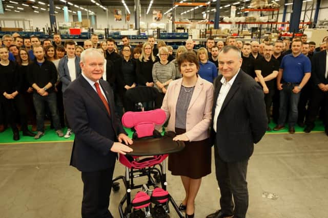 First and Deputy First  Ministers Arlene Foster and Martin McGuinness pictured with James Leckey and staff