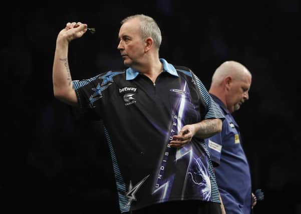 Phil Taylor who secured a 7-0 win over Robert Thorton. Pic Lawrence Lustig/PDC