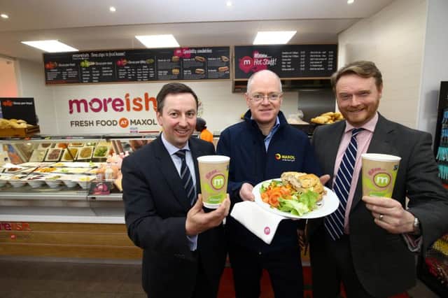 Maxol Group general manager Brian Donaldson, independent licensee of Scarva Road, Terry Mulkerns and Maxol NI retail manager Kevin Paterson