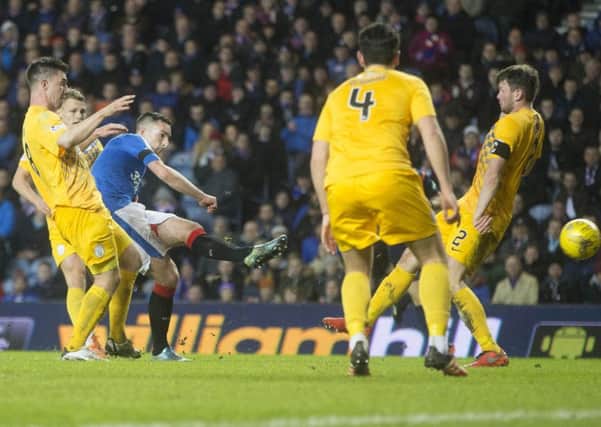 Rangers' Lee Wallace scores his side's third goal of the game