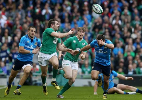 Ireland's Jared Payne offloads the ball during the 2016 RBS 6 Nations against Italy