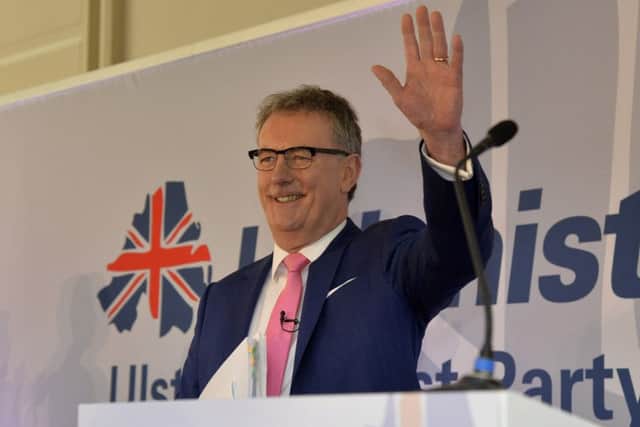 Mike Nesbitt waves to party members as he prepares to address the UUP spring conference at the Armagh Hotel.
