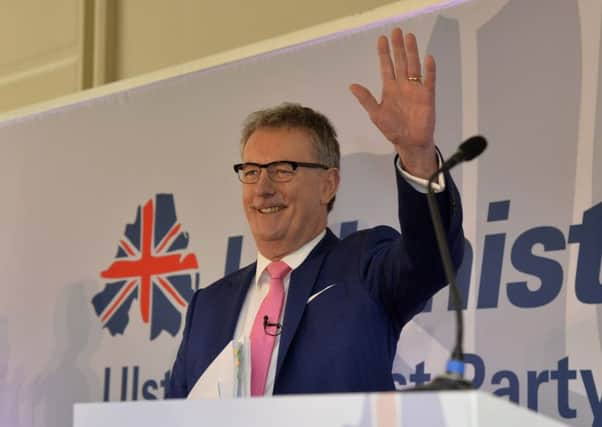 Mike Nesbitt waves to party members as he prepares to address the UUP spring conference at the Armagh Hotel.