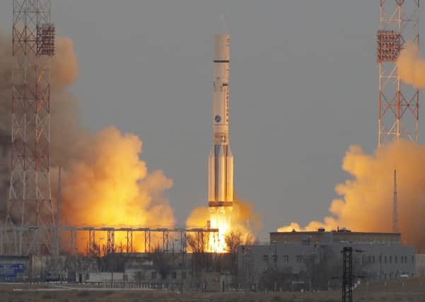 The Proton-M rocket booster blasts off at the Russian leased Baikonur cosmodrome, Kazakhstan, Monday, March 14, 2016